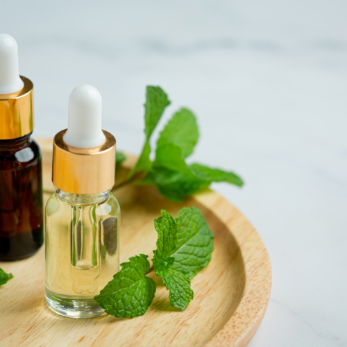 essential-oil-peppermint-bottle-with-fresh-green-peppermint